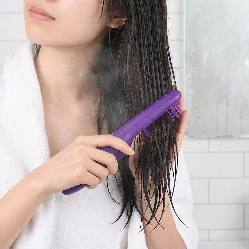 Automatic hair detangling brush